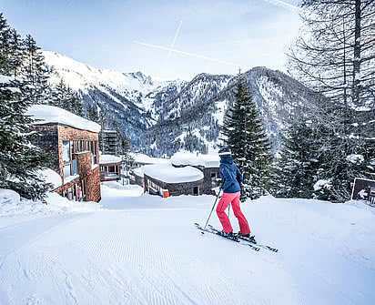 Hausgast fährt Ski im Großglockner Skigebiet im Gradonna Mountain Resort